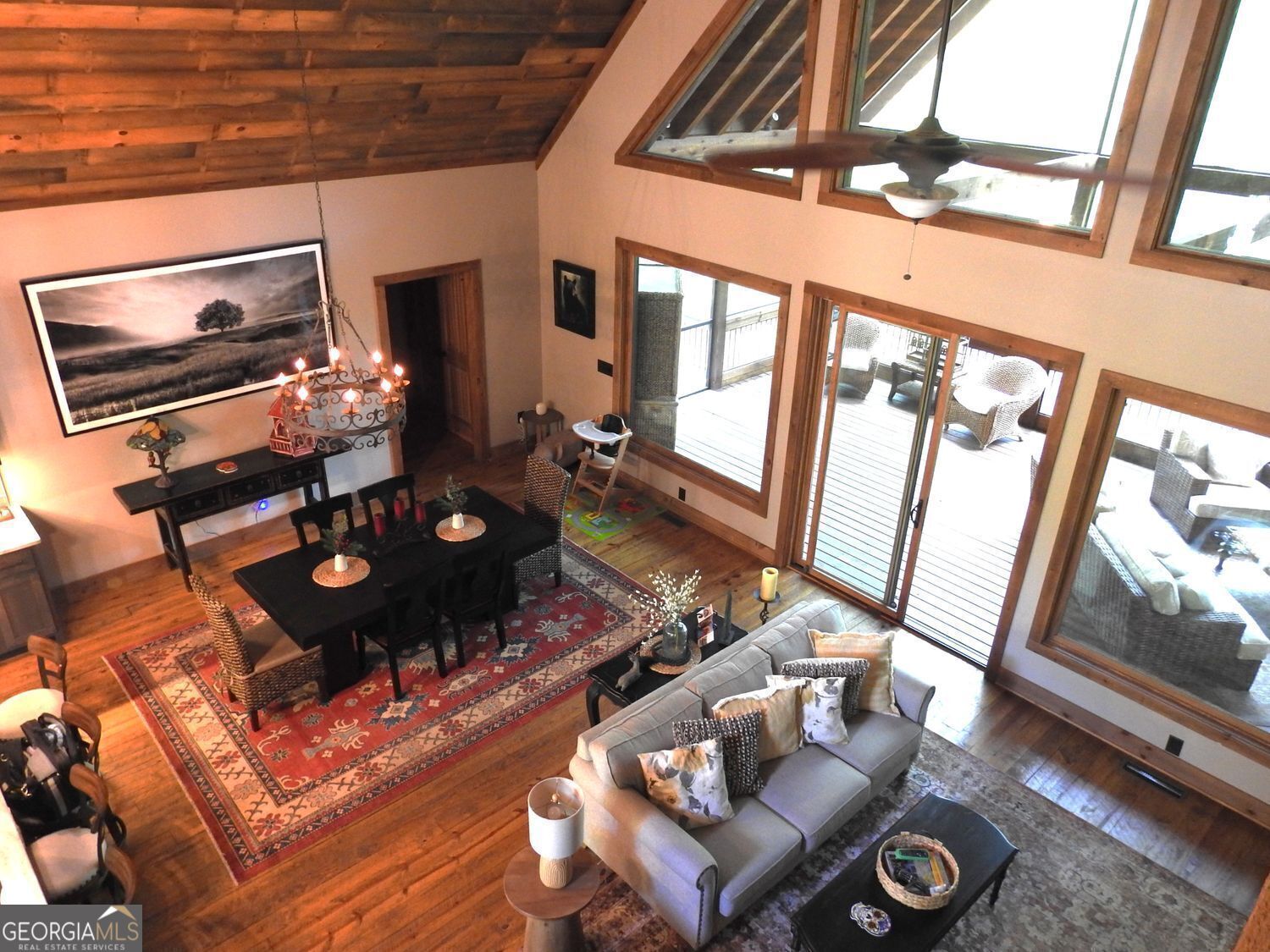 366 Shepherds Lane Morganton, GA 30560 - Photo 49 of 77 a living room with furniture and a floor to ceiling window