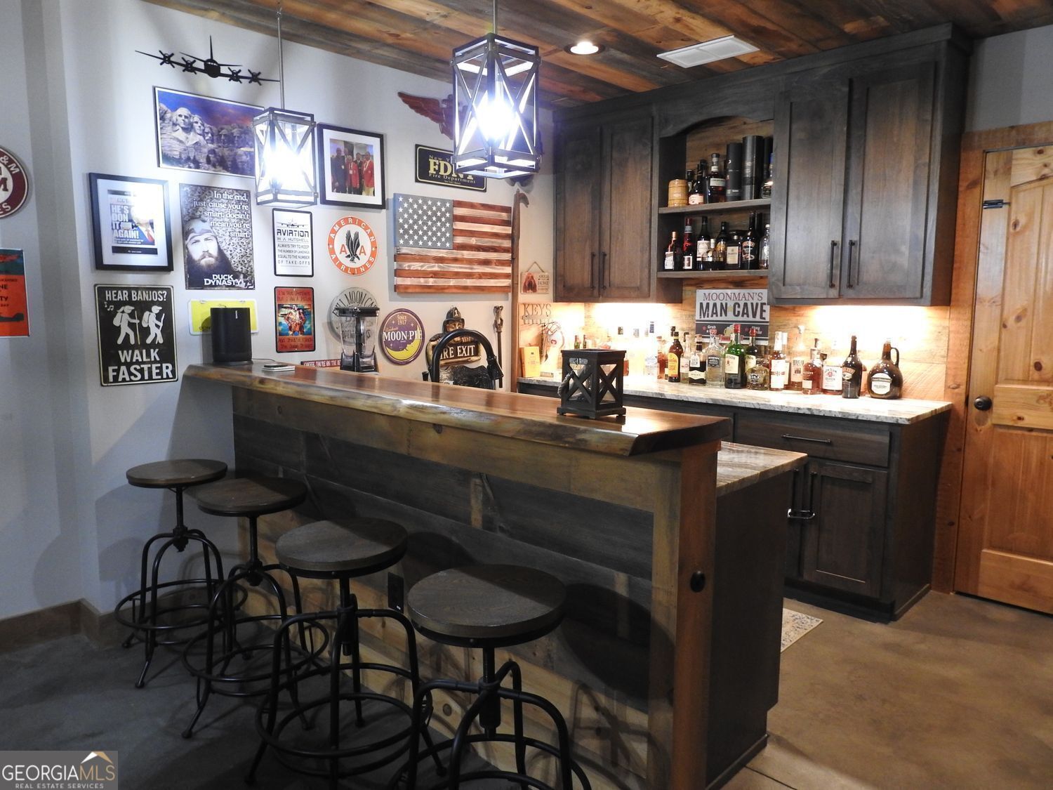 366 Shepherds Lane Morganton, GA 30560 - Photo 60 of 77 a kitchen with a sink stove and chairs