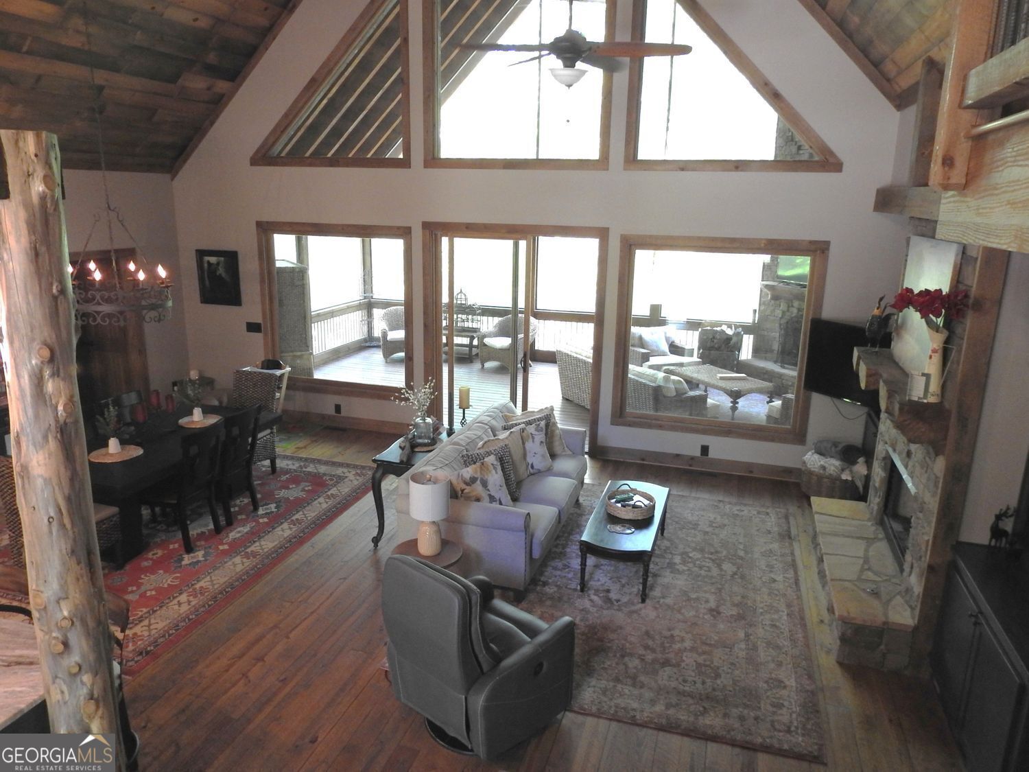 366 Shepherds Lane Morganton, GA 30560 - Photo 6 of 77 a living room with furniture and a floor to ceiling window