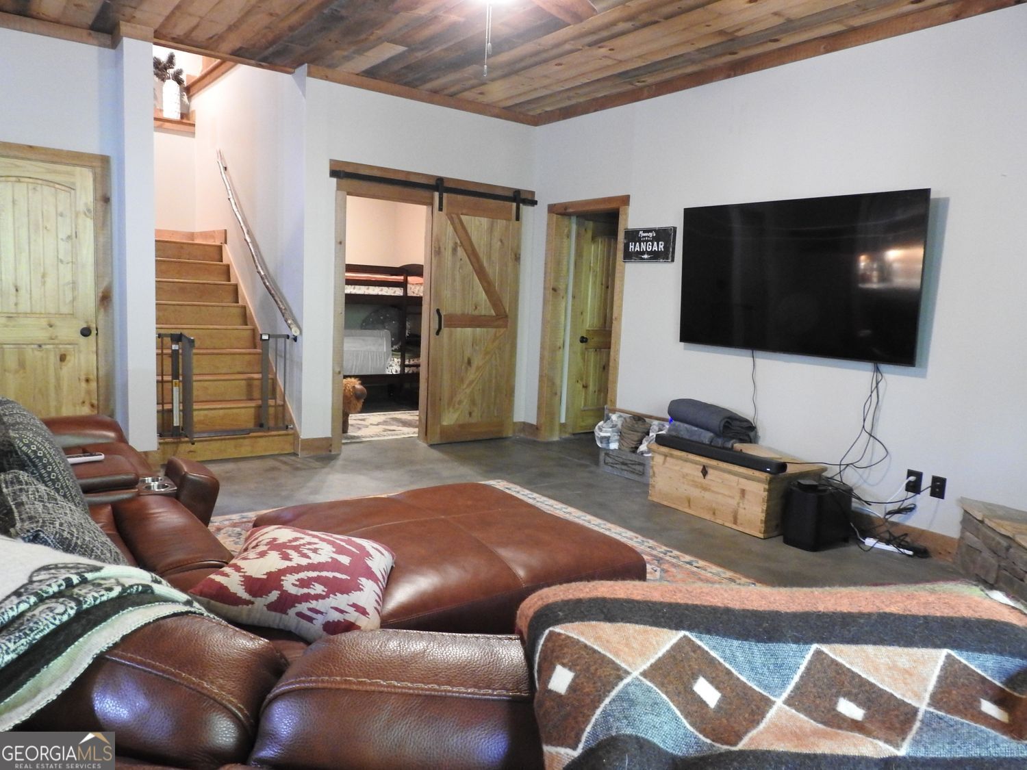 366 Shepherds Lane Morganton, GA 30560 - Photo 67 of 77 a living room with furniture and a flat screen tv