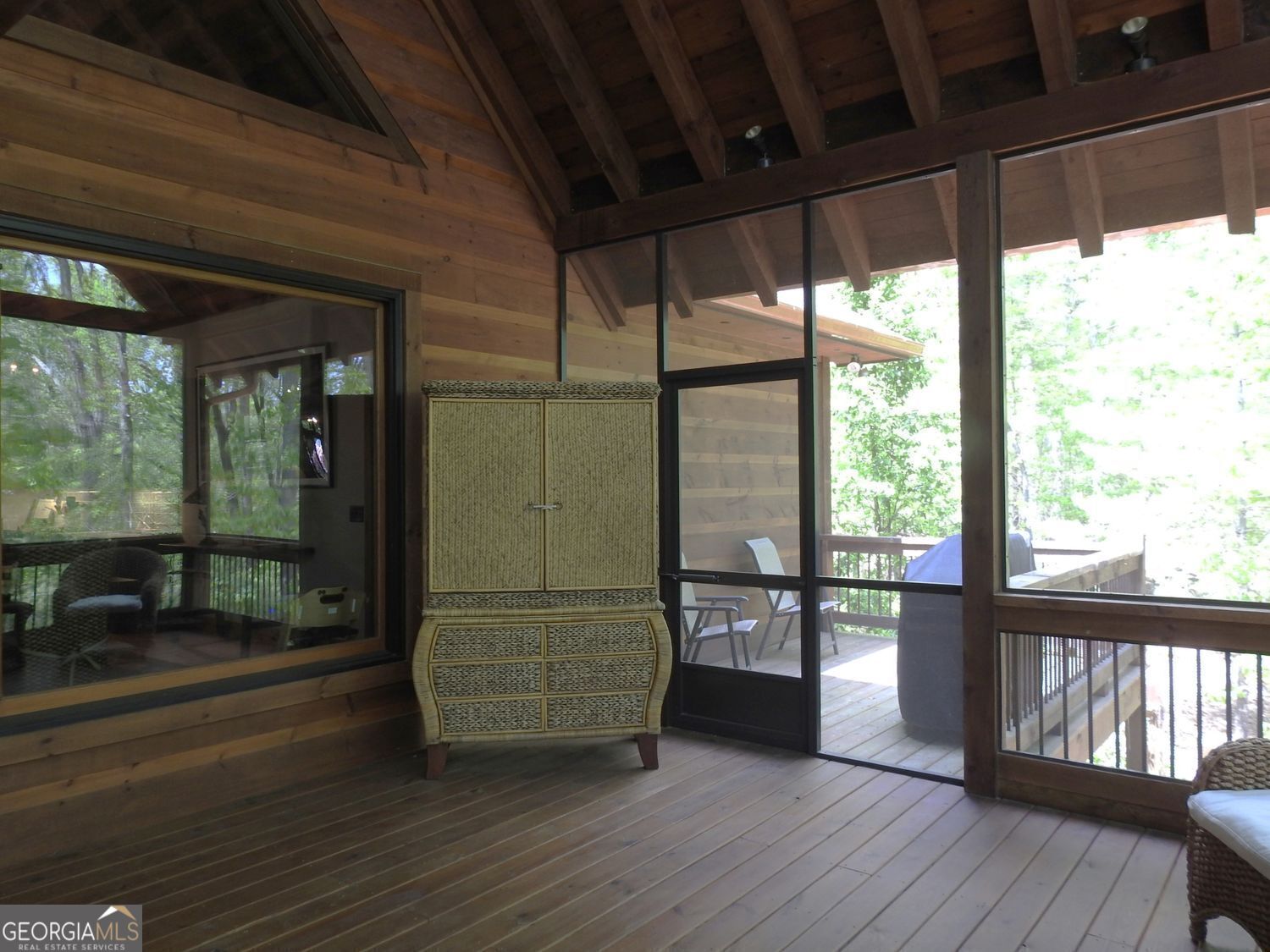 366 Shepherds Lane Morganton, GA 30560 - Photo 7 of 77 a living room with furniture and large windows