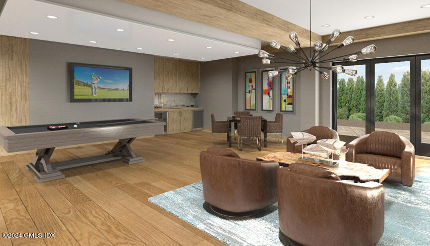 16 Old Track Road, Unit PH #3 Greenwich, CT 06830 - Photo 3 of 25 a living room with couches a fireplace and a potted plant