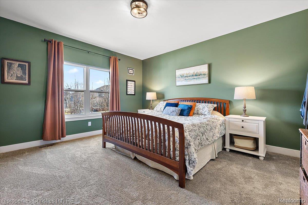 913 Ridge Road South Canton, MI 48188 - Photo 27 of 51 Bedroom featuring baseboards and carpet floors