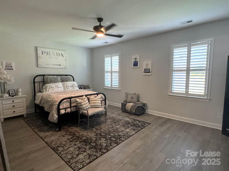 4995 Looking Glass Trail Denver, NC 28037 - Photo 16 of 32 a bedroom with a bed and window