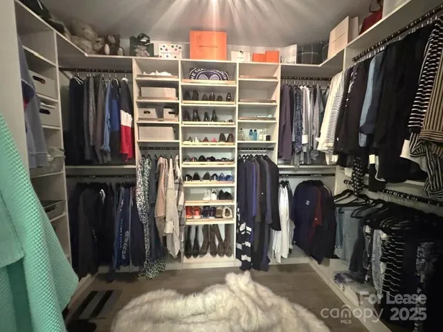 a bathroom with a granite countertop sink mirror and double