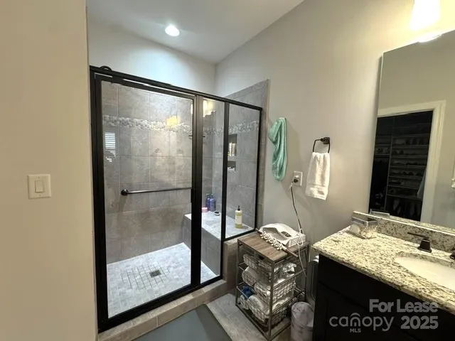 a bedroom with furniture a bed and a window