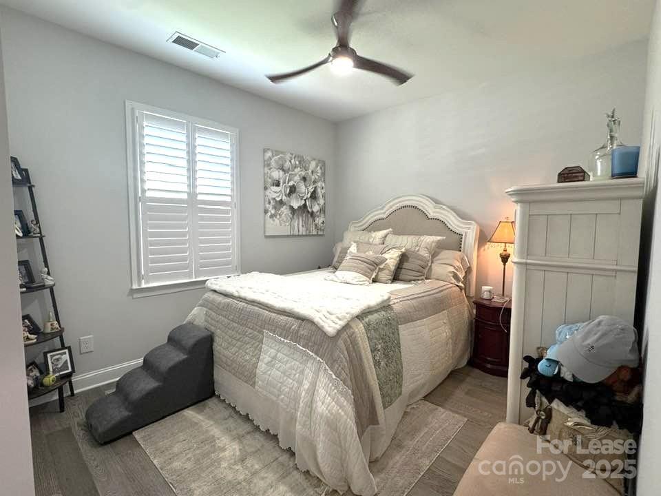 4995 Looking Glass Trail Denver, NC 28037 - Photo 23 of 32 a bedroom with a bed and a window