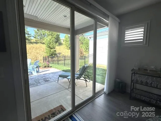 a view of a workspace with furniture