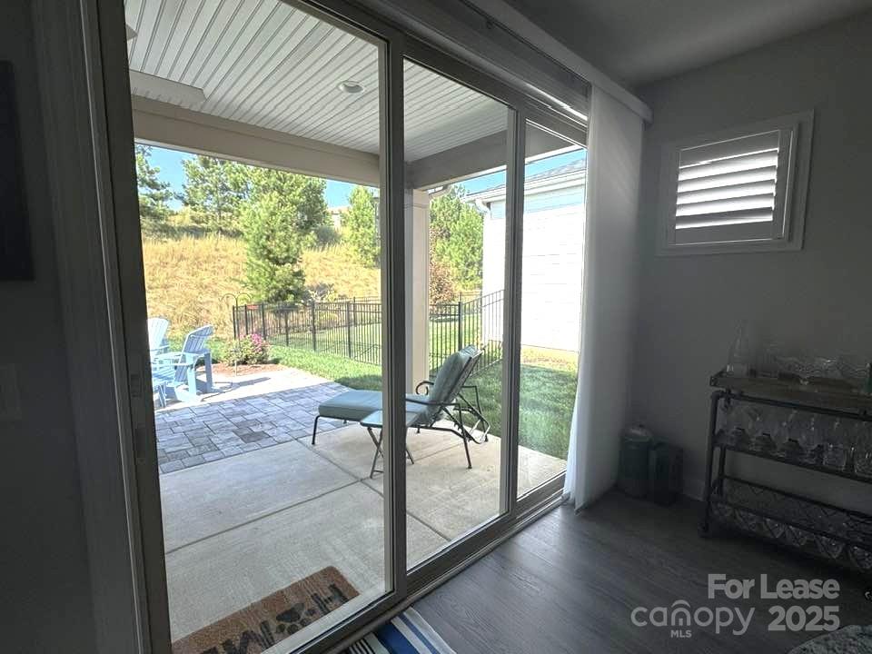 4995 Looking Glass Trail Denver, NC 28037 - Photo 26 of 32 a view of a room with wooden floor and windows