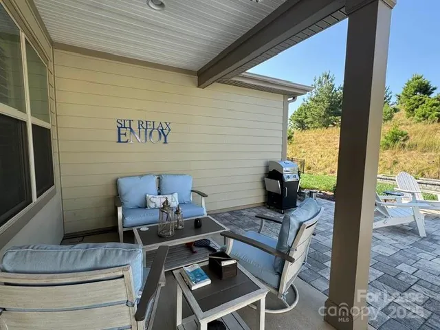 a view of a outdoor seating area with furniture