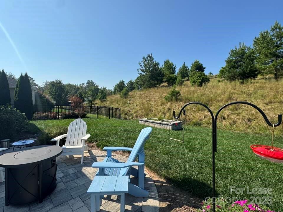 4995 Looking Glass Trail Denver, NC 28037 - Photo 31 of 32 a view of a garden with plants and outdoor seating