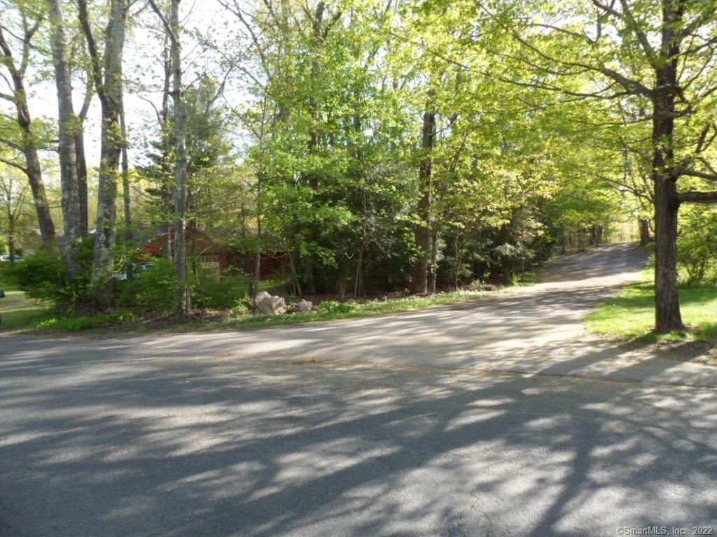 100 Colburn Road Stafford, CT 06076 - Photo 1 of 1 a view of a house with a yard and basketball court