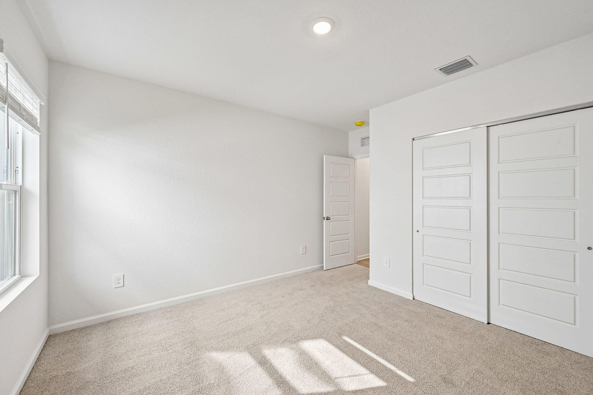 14503 Southwest New Dawn Road Indiantown, FL 34956 - Photo 23 of 42 a view of an empty room