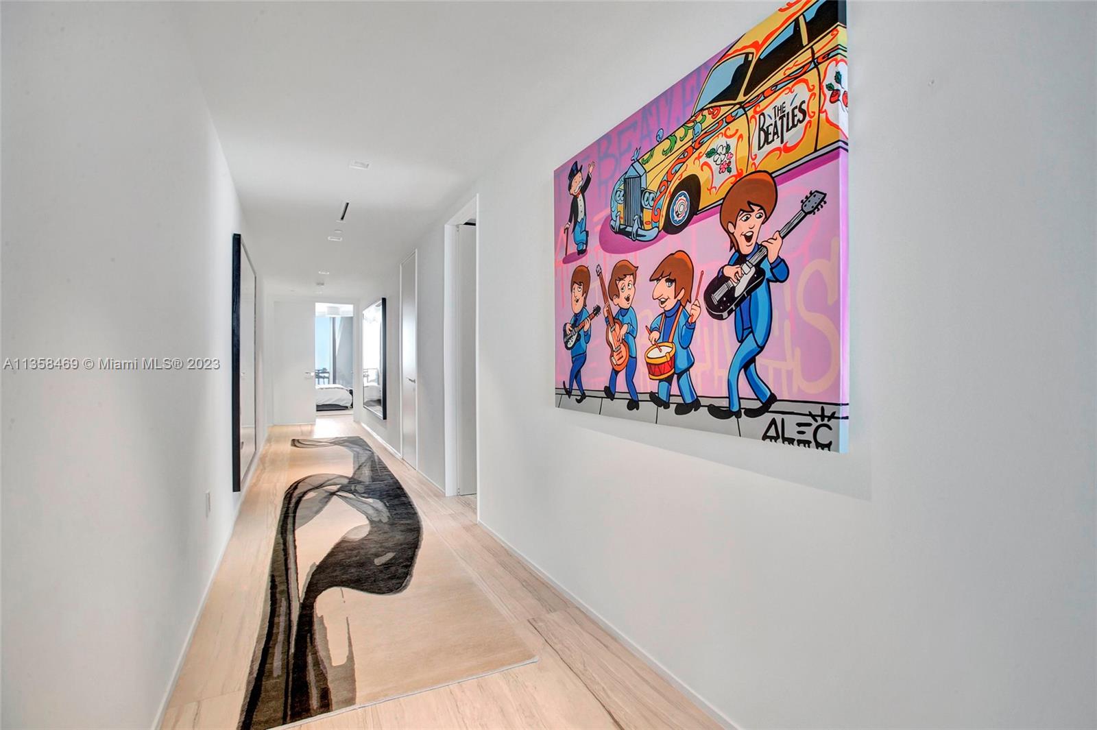 1000 Biscayne Boulevard, Unit 2802 Miami, FL 33132 - Photo 18 of 38 a view of a bedroom with painting on the wall