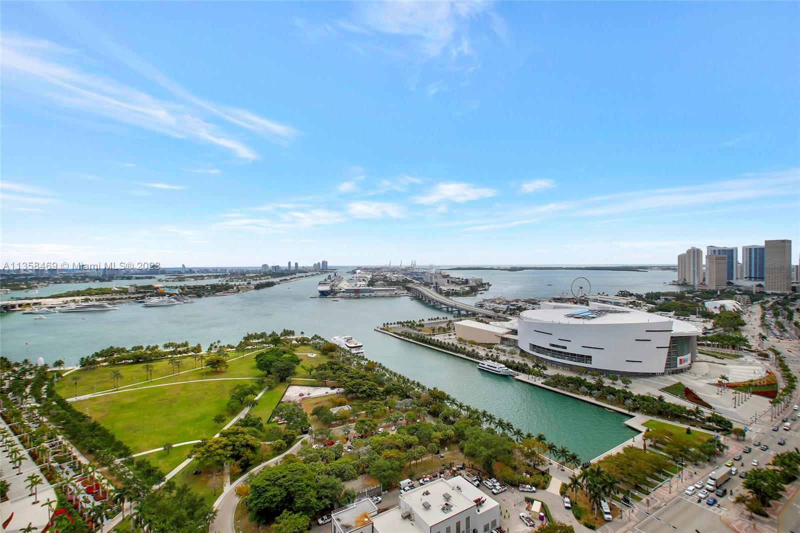1000 Biscayne Boulevard, Unit 2802 Miami, FL 33132 - Photo 2 of 38 a view of a lake with a city