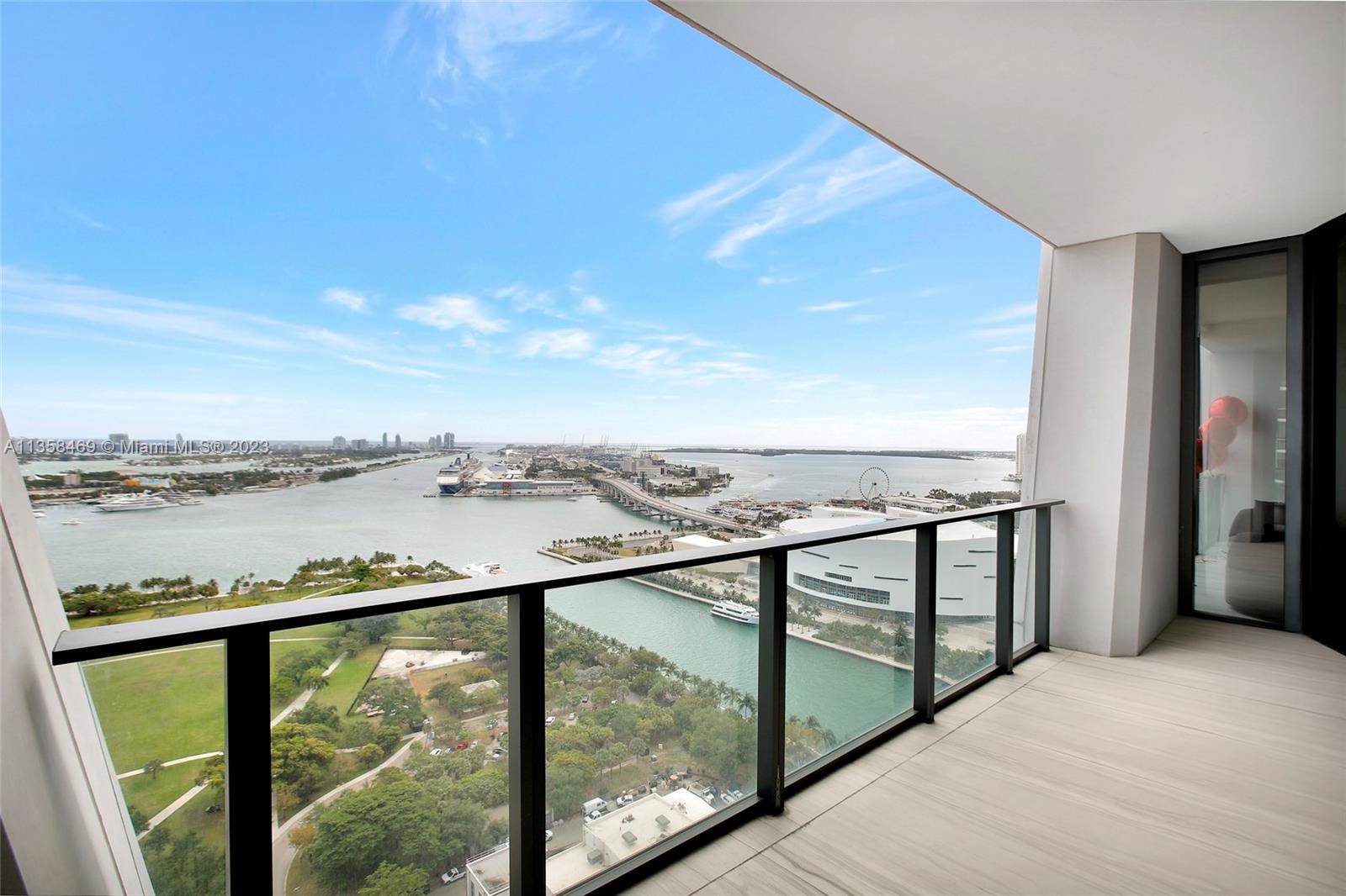 1000 Biscayne Boulevard, Unit 2802 Miami, FL 33132 - Photo 33 of 38 a view of a balcony next to a lake view