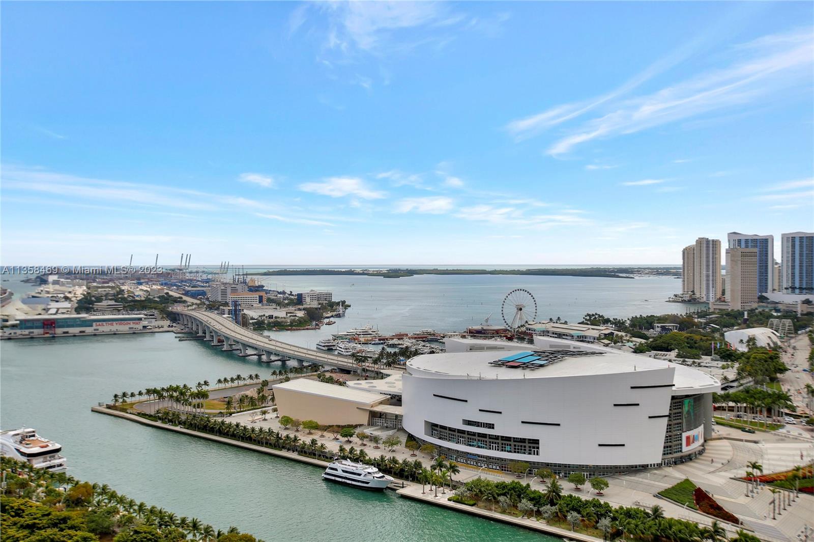 1000 Biscayne Boulevard, Unit 2802 Miami, FL 33132 - Photo 36 of 38 a view of a city with lawn chairs
