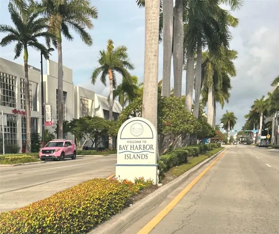 a sign that is on the side of a street