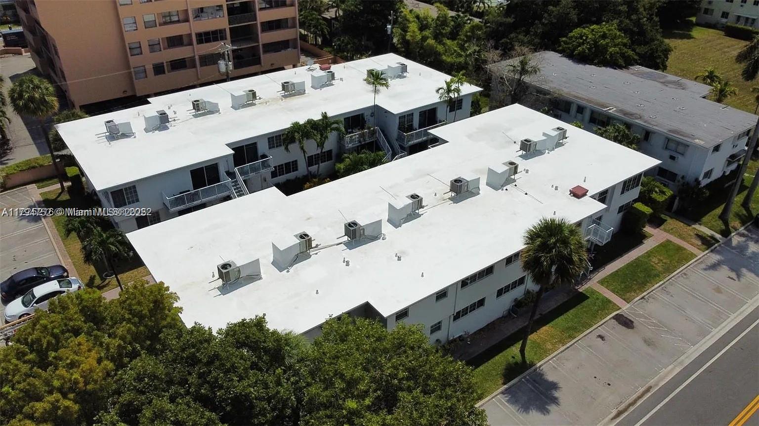 9260 Bay Harbor Terrace, Unit 22 Bay Harbor Islands, FL 33154 - Photo 23 of 24 an aerial view of a large building