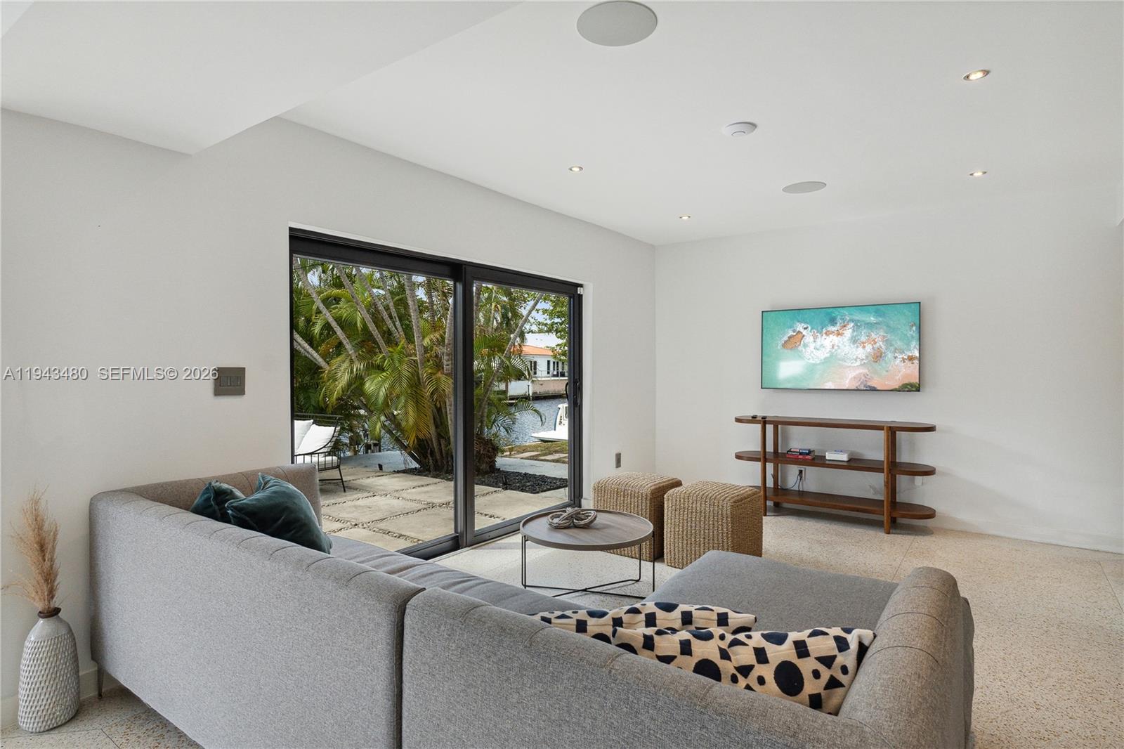 12901 Oleander Road North Miami, FL 33181 - Photo 16 of 30 a living room with furniture and a window