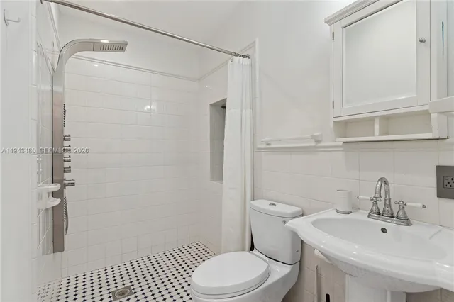 a house with a tree in the background