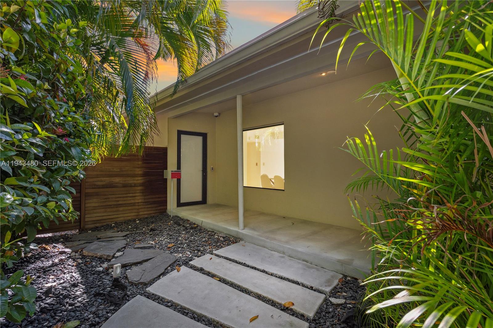 12901 Oleander Road North Miami, FL 33181 - Photo 28 of 30 a house with a tree in the background