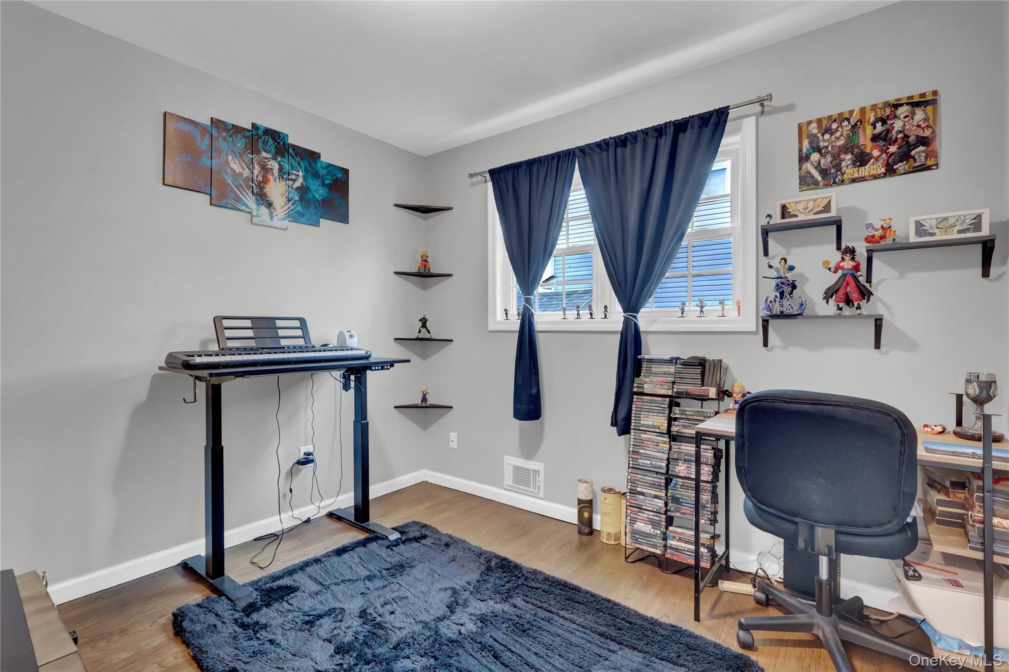 7 Winston Road Centereach, NY 11720 - Photo 16 of 18 a view of a workspace with furniture and a window