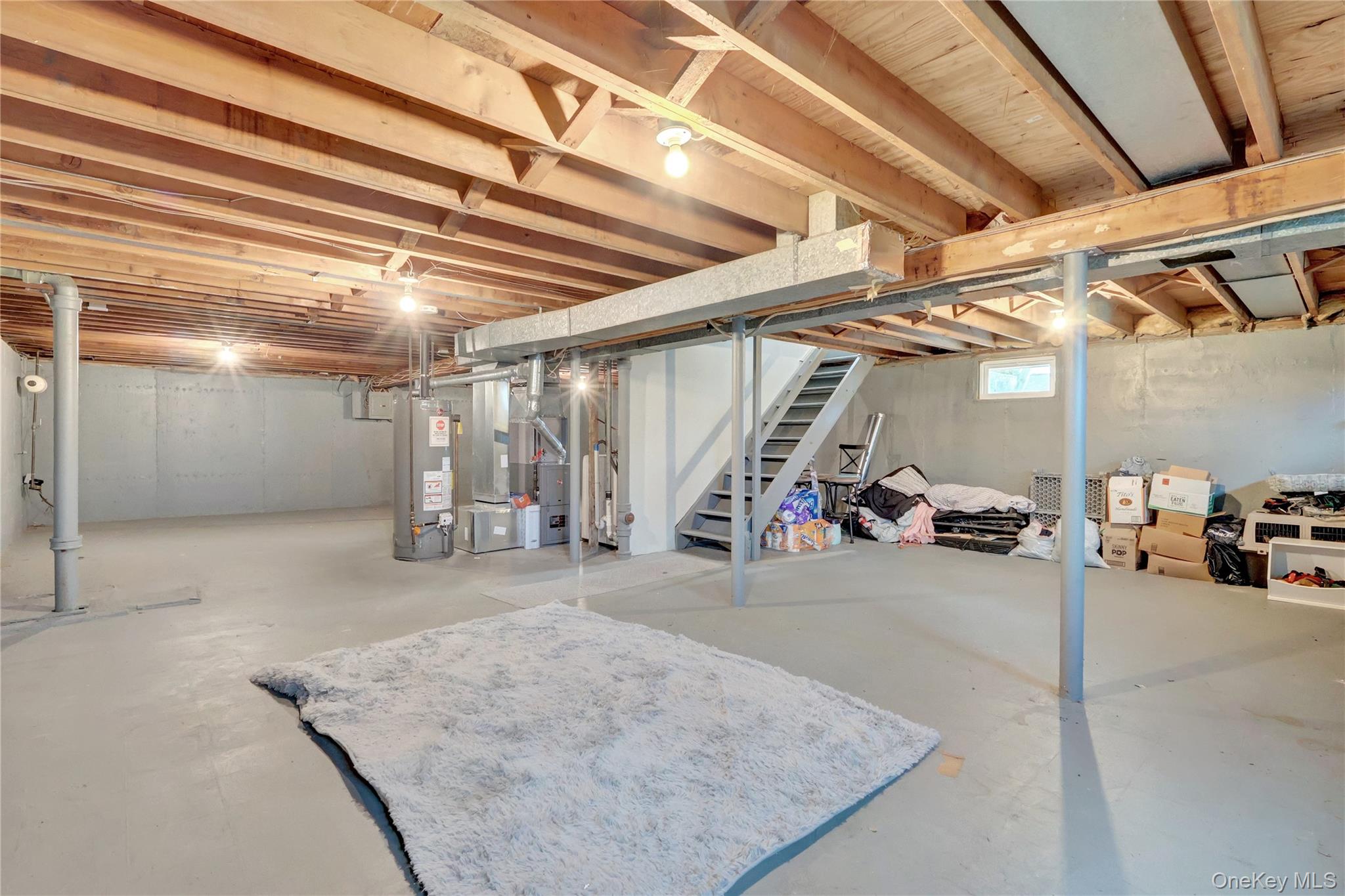 7 Winston Road Centereach, NY 11720 - Photo 18 of 18 a view of parking garage with cars