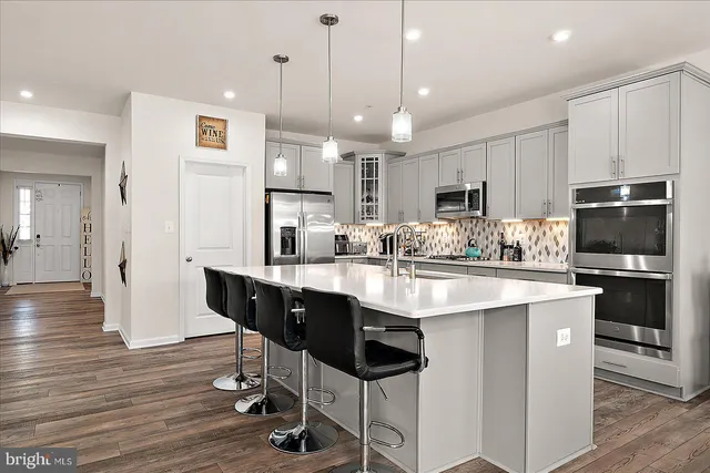 a living room with furniture and window
