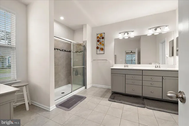 a view of a patio with a table and chairs