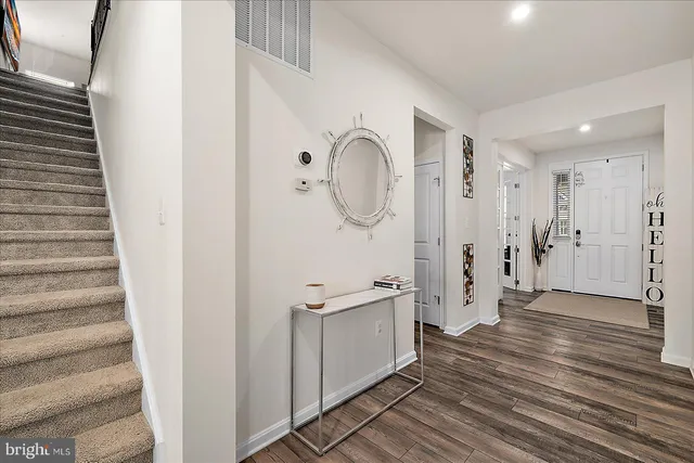 a front view of a house with swimming pool