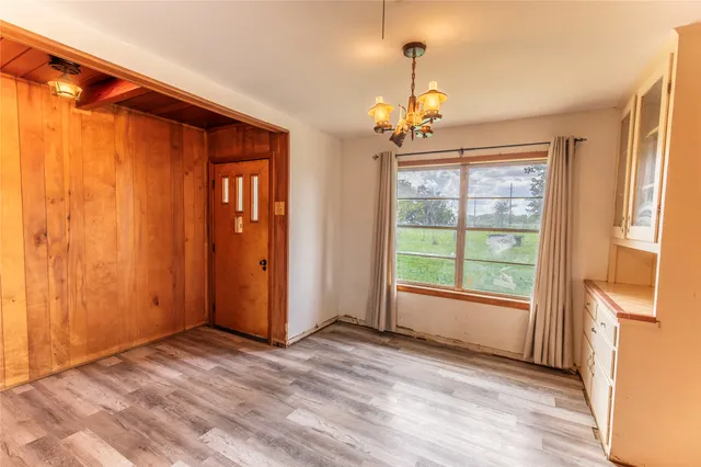 a kitchen with a stove a sink and a refrigerator