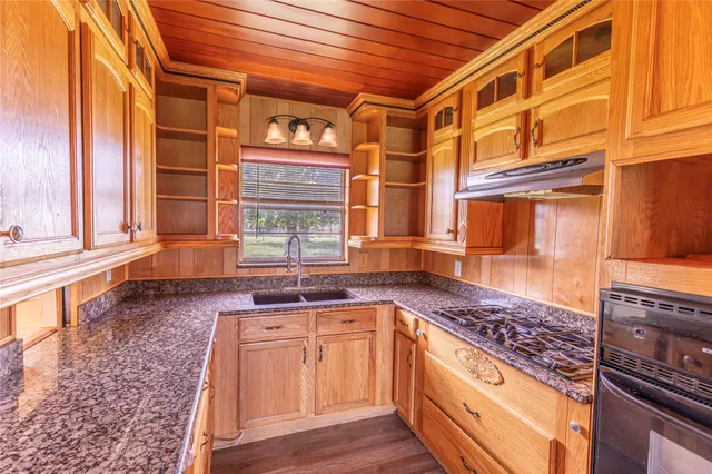 a bathroom with a sink a bath tub and a shower