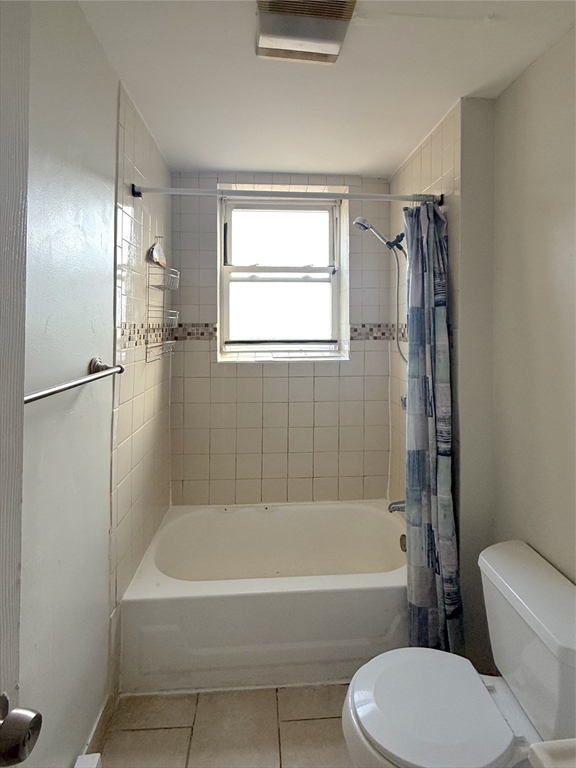 20 Huss Court, Unit 105 Lynn, MA 01905 - Photo 10 of 16 a bathroom with a bathtub toilet and shower