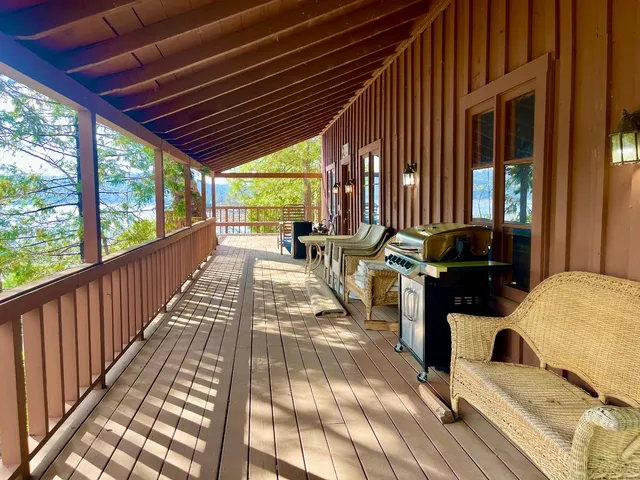 a view of a patio with wooden floor