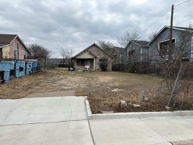 1167 Springdale Road Austin, TX 78721 - Photo 3 of 5 a front view of a house with a yard