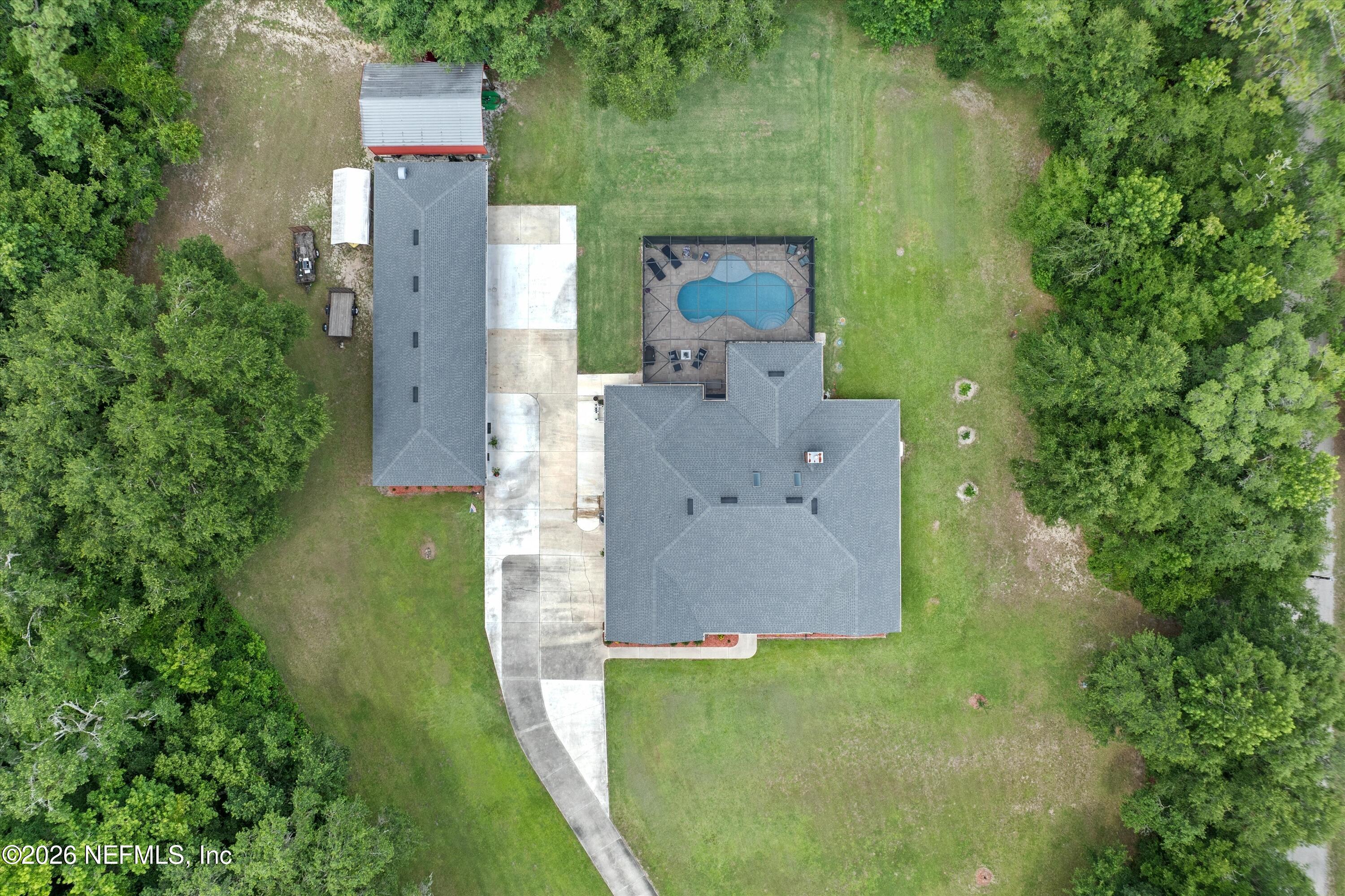 5566 Don Manuel Road Elkton, FL 32033 - Photo 46 of 47 an aerial view of a house with a yard