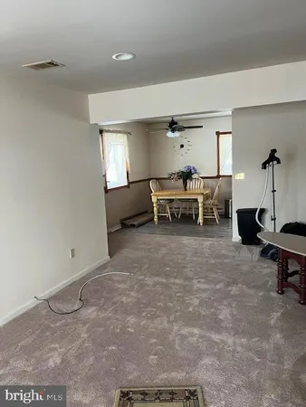 a view of a livingroom with furniture