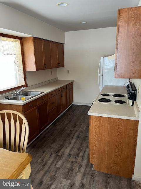 16 Archertown Road, Unit B New Egypt, NJ 08533 - Photo 12 of 19 a kitchen with stainless steel appliances granite countertop a stove a sink and a microwave