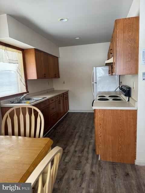 16 Archertown Road, Unit B New Egypt, NJ 08533 - Photo 2 of 19 a kitchen with a stove a sink and a refrigerator