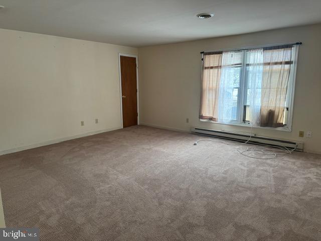 16 Archertown Road, Unit B New Egypt, NJ 08533 - Photo 6 of 19 an empty room with large windows