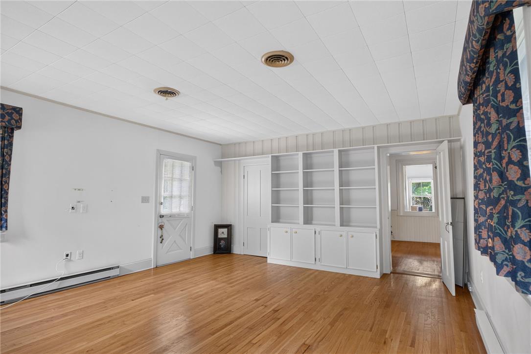 765 East Macada Road Bethlehem, PA 18017 - Photo 24 of 46 Built-in shelving and hardwood floors define this flexible, inviting space.