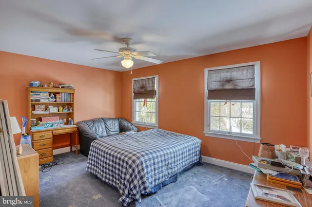 a workspace with furniture and a window