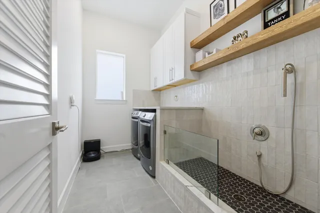 a utility room with dryer and washer