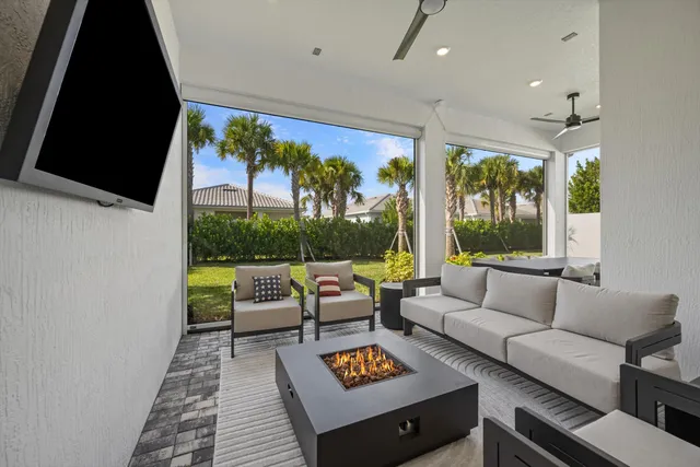 a room with a bed and a large window