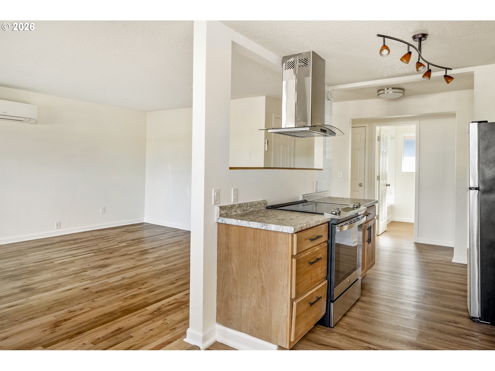500 Depot Street Fairview, OR 97024 - Photo 12 of 28 a kitchen with stainless steel appliances granite countertop a stove and a wooden floors