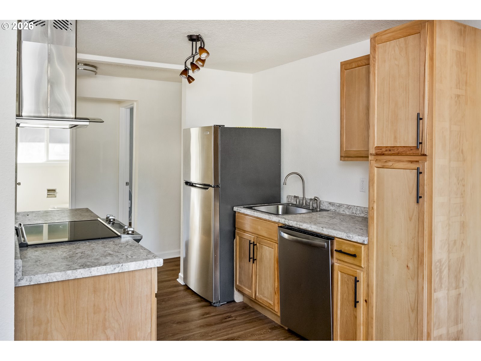 500 Depot Street Fairview, OR 97024 - Photo 13 of 28 a kitchen with stainless steel appliances granite countertop a sink stove and refrigerator