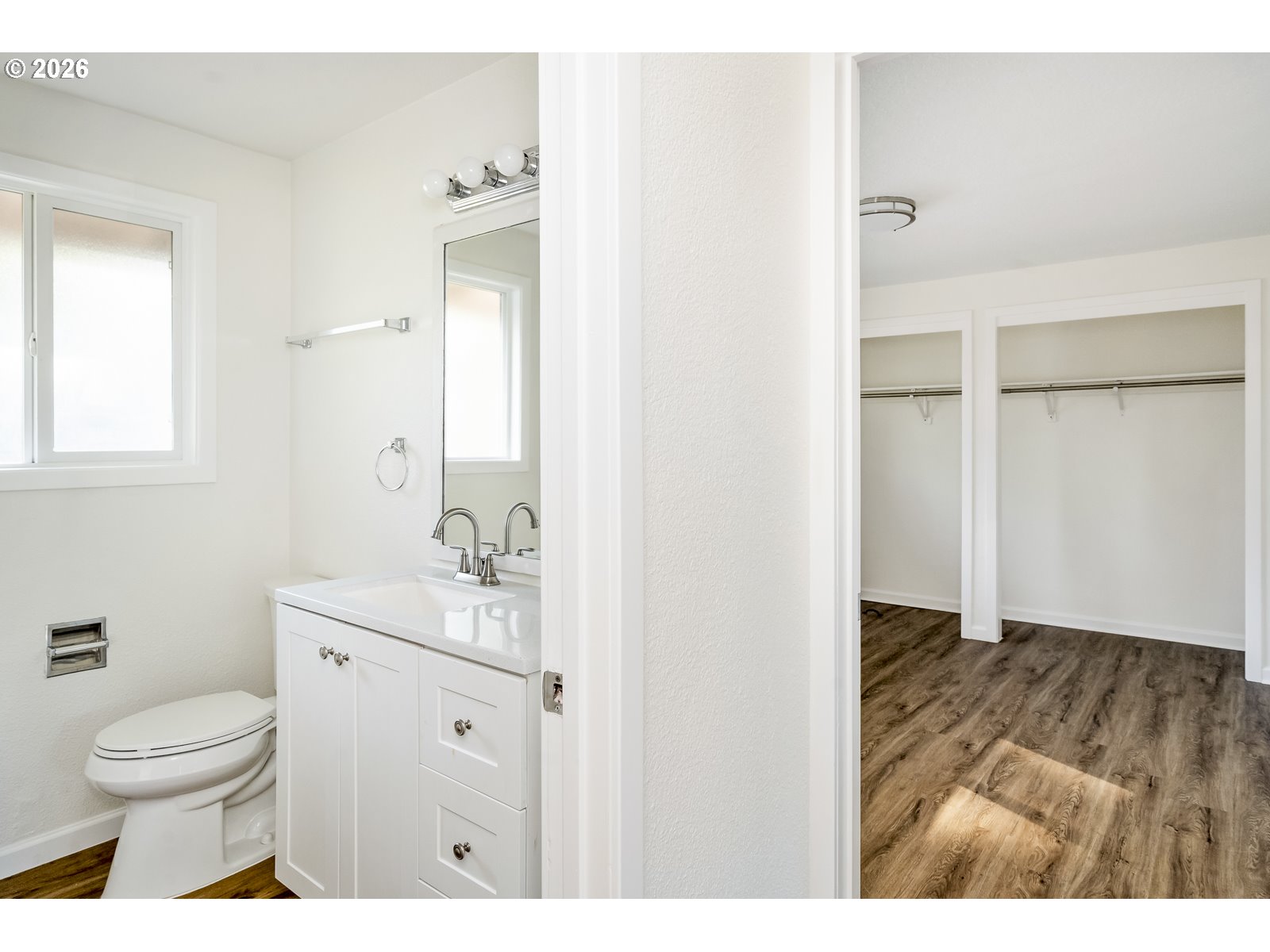 500 Depot Street Fairview, OR 97024 - Photo 17 of 28 a bathroom with a toilet sink a mirror and vanity