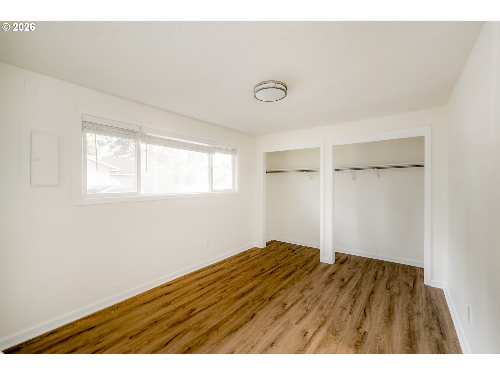 500 Depot Street Fairview, OR 97024 - Photo 24 of 28 a view of an empty room with wooden floor and a window