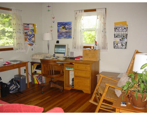 388 Burts Pit Road Northampton, MA 01062 - Photo 8 of 14 a view of a workspace with furniture and a window